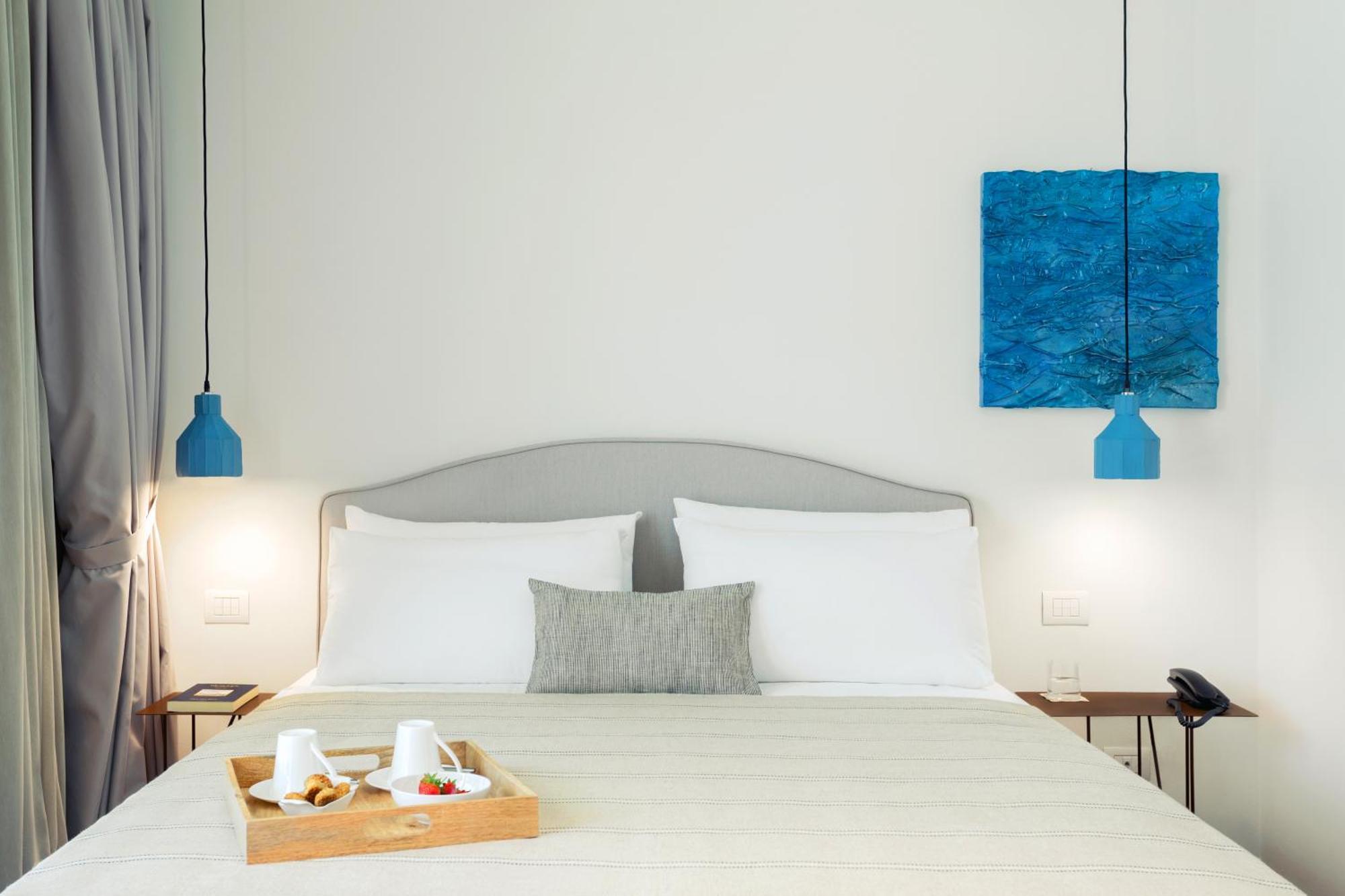 Domia Boutique Hotel E Cucina Монделло Номер фото